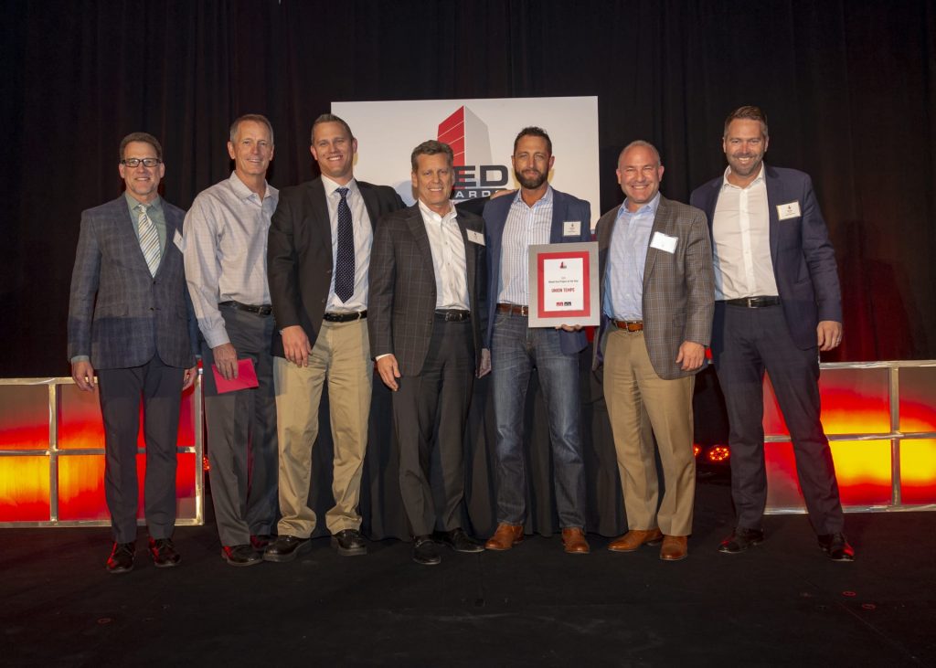 (From left to right) Rich Gohl, Jim Drago, Kelly Wyllie, Larry Pobuda (Opus), Garren Echols, Brett Hopper (Opus) and Ryan Abbott accept the award for Mixed-Use Project of the Year for Union Tempe