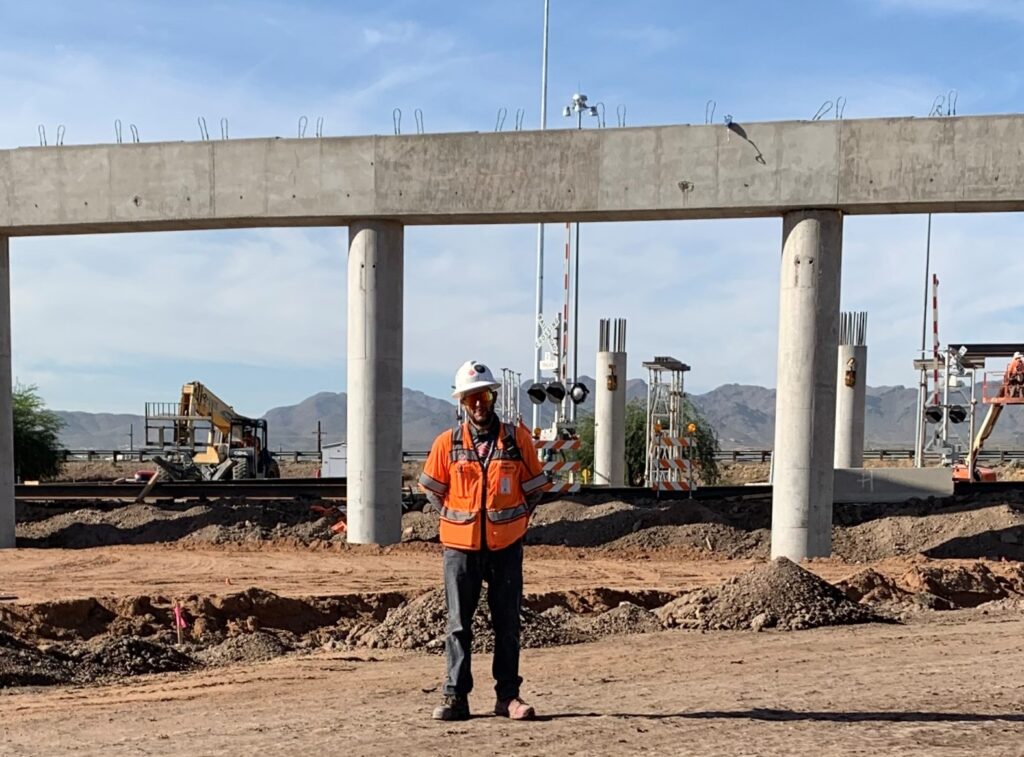 foreman Jesse DeHaro stands in front of columns on the ruthrauff I-10 project