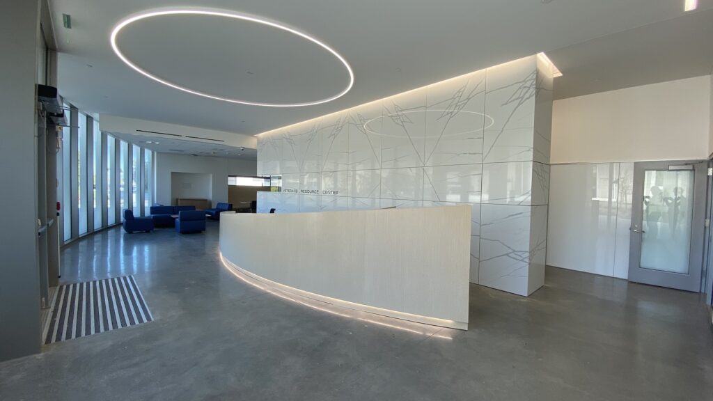 lobby with white marble walls at new veterans resource center at Cypress College