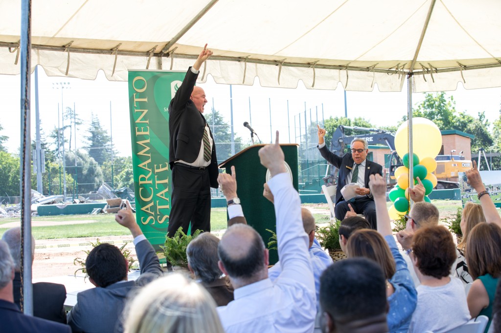 Sacramento State President Robert Nelsen and crowd put their “stingers up.”