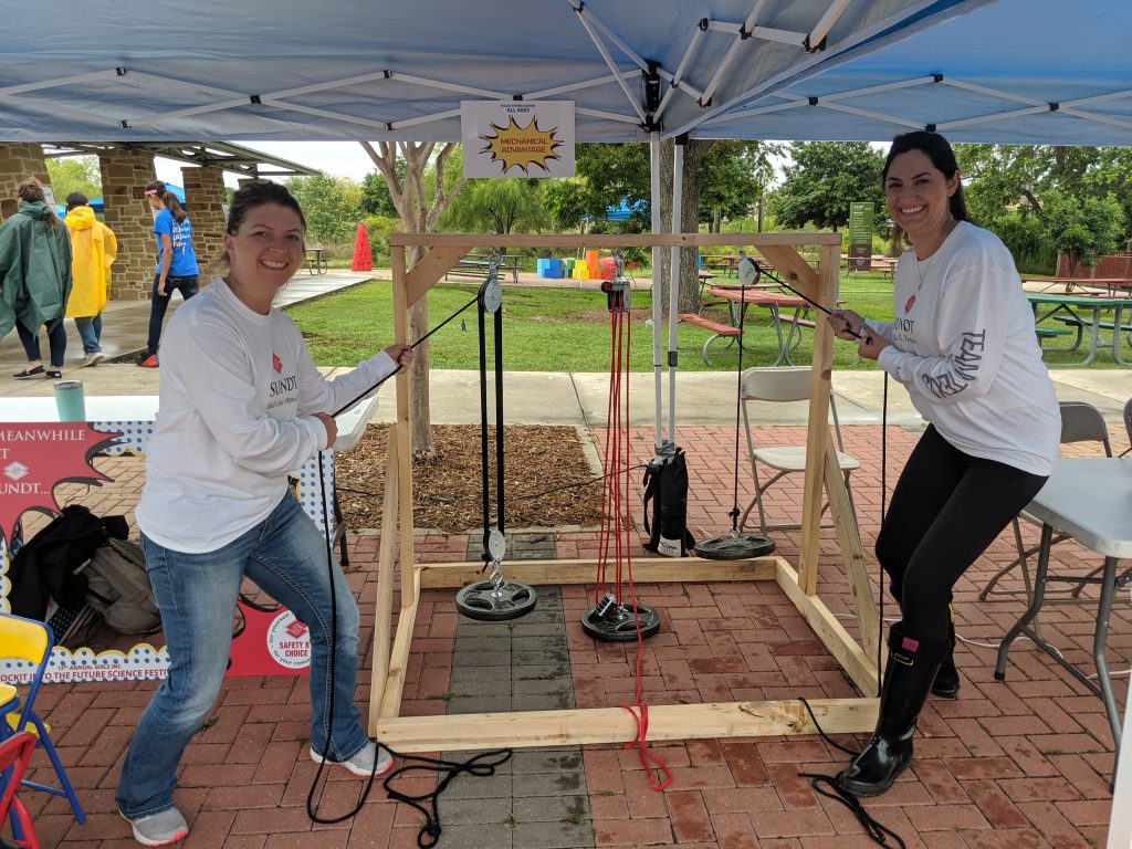 Alexis Marshall and Amy Yount demonstrate the pulley system.