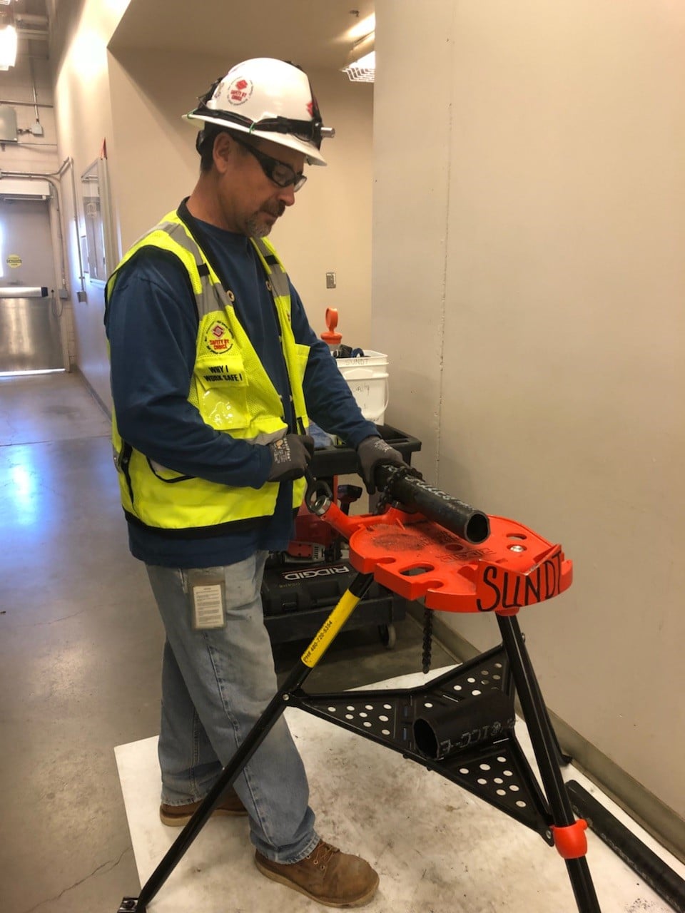 Craft professional Michael Gallegos, performing pipefitting work on the jobsite 