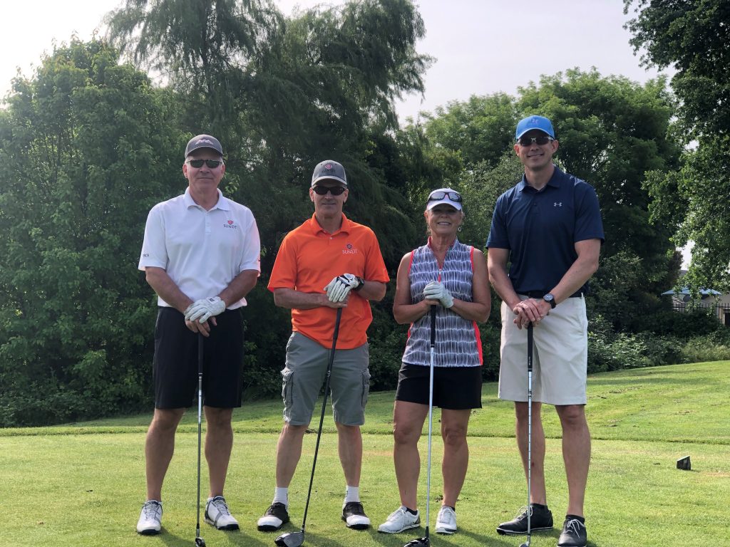 Sundt CEO Mike Hoover, VP and Regional Director Jim Larrieu, Building Group President Teri Jones and Project Executive Mike Mielcarek came out to add their support and show off their skills.