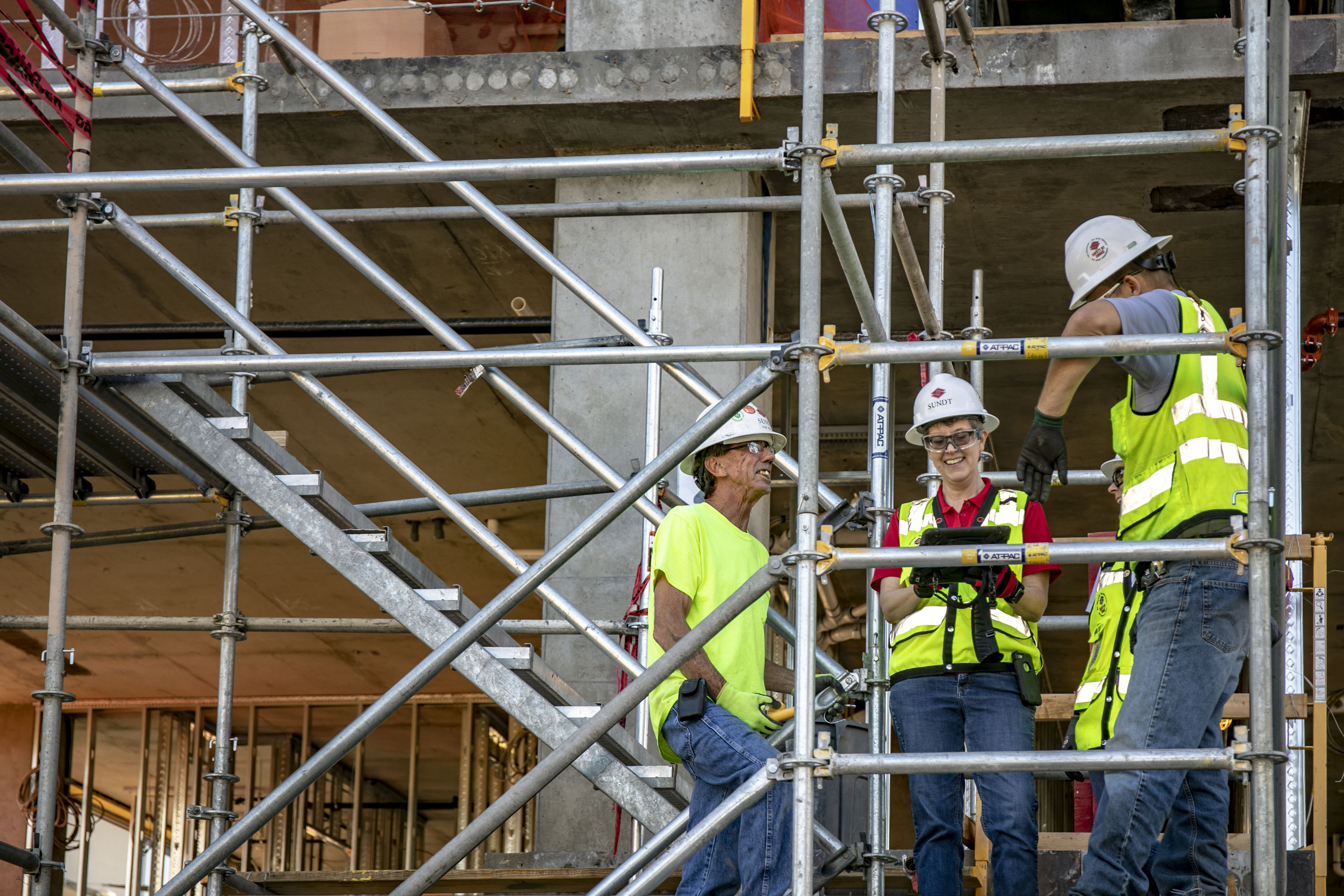 Hannah on site meeting with fellow employee-owners Mike McGee, Adrianne Coffinger and Kelly Wyllie.