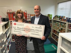 Sundt foundation presents check to marana food bank