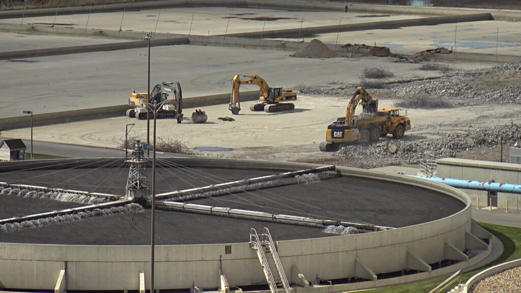 drying beds being demolished with concrete to be reused elsewhere on site