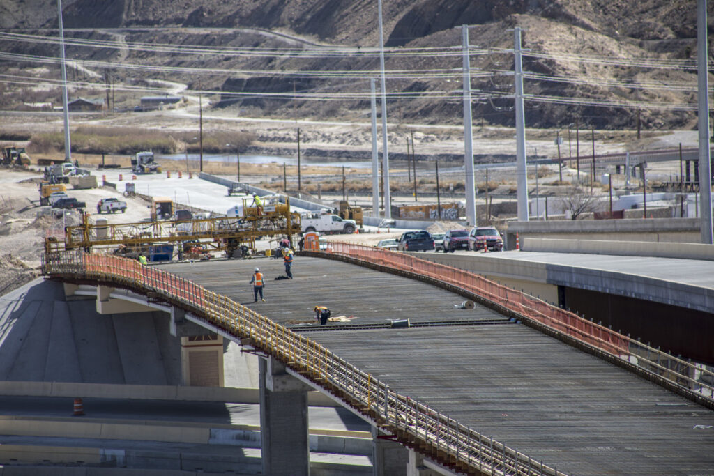 Workers on the deck of Bridge 18, connecting I-10 as part of TxDOT El Paso's GO 10 project