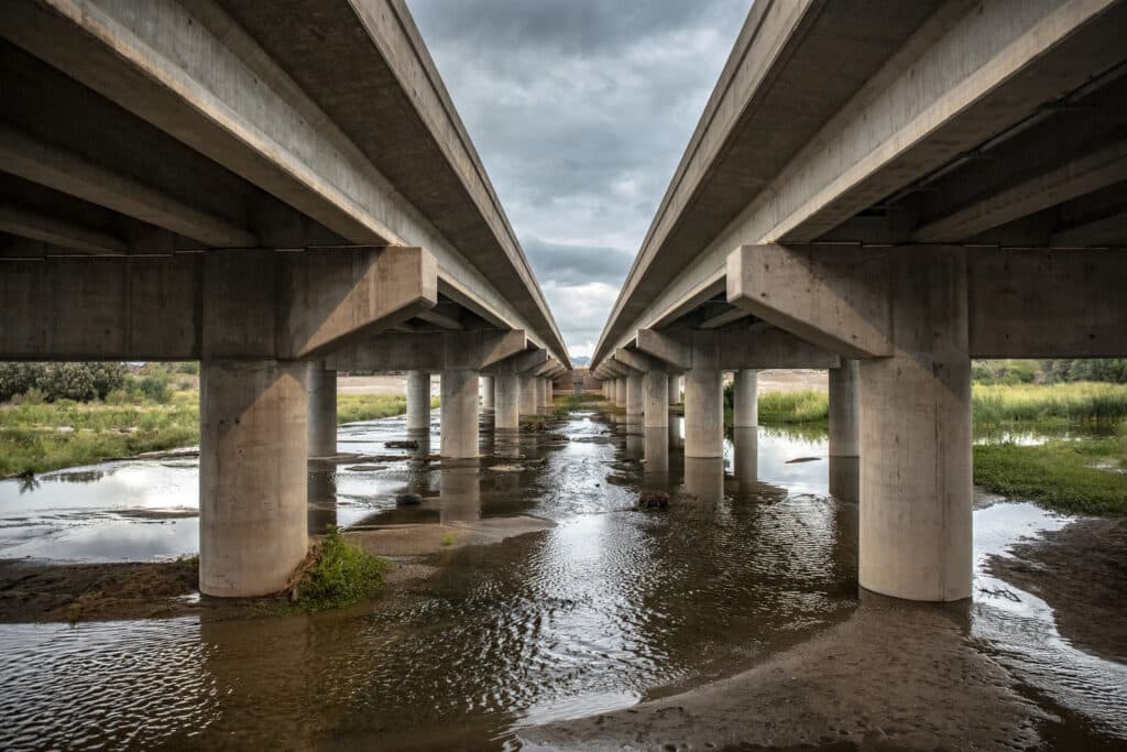 view from underneath the New Santa Cruz River bridge showing creek running