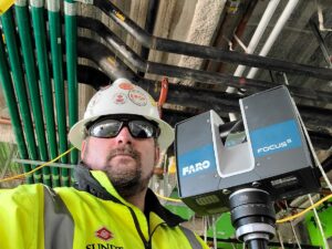 sundt vdc engineer howdy atkinson holding a 3d laser scanner