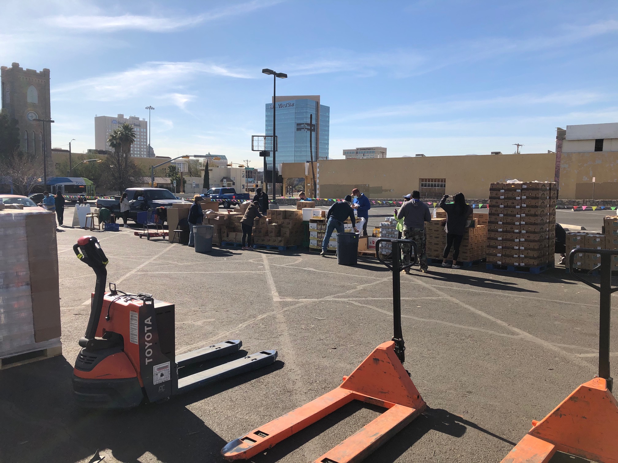 electric pallet movers outside of kelly center for hunger relief