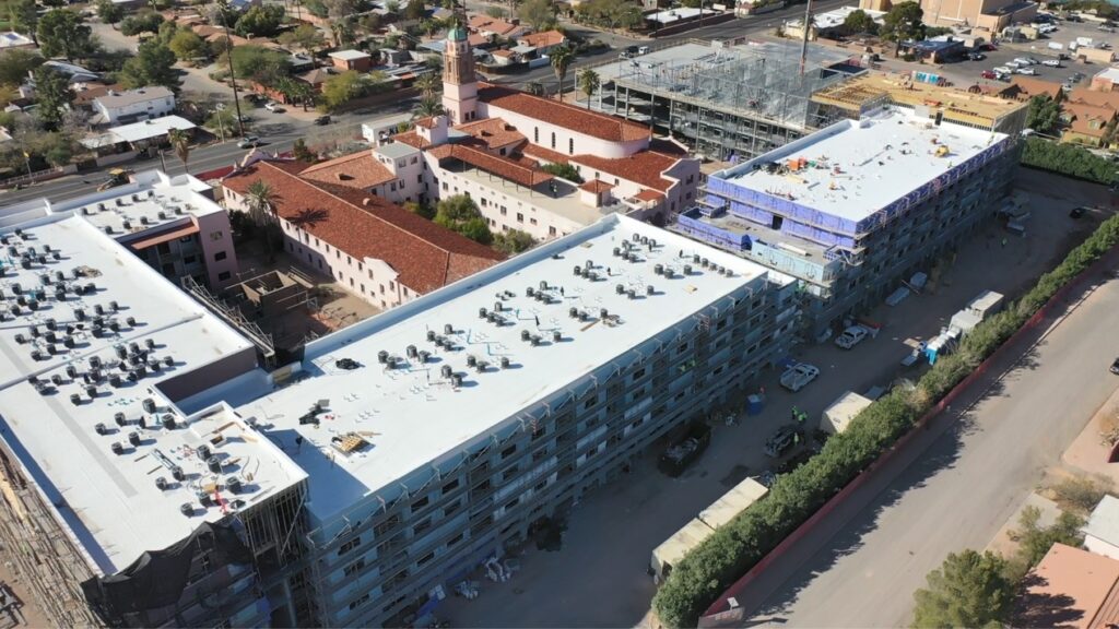 aerial drone view of nearly finished monastery apartment complex in Tucson Arizona