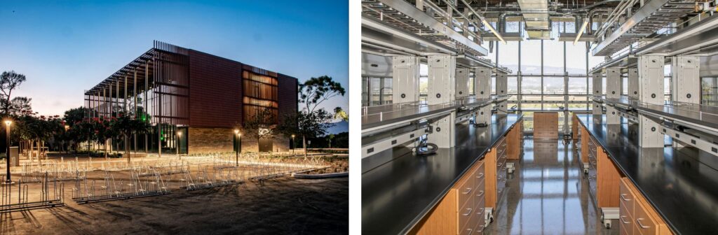 night-time exterior view of three story henley hall with steel, glass and stone facade