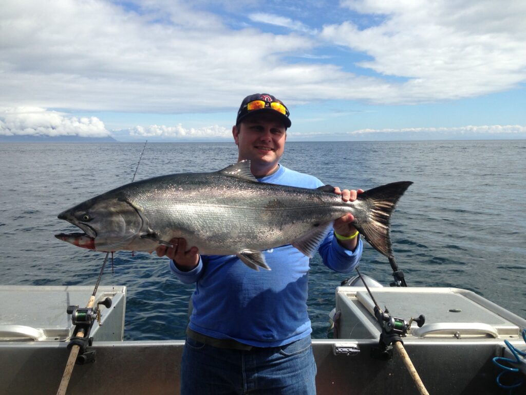 Project Executive David Rieken holds up his fish